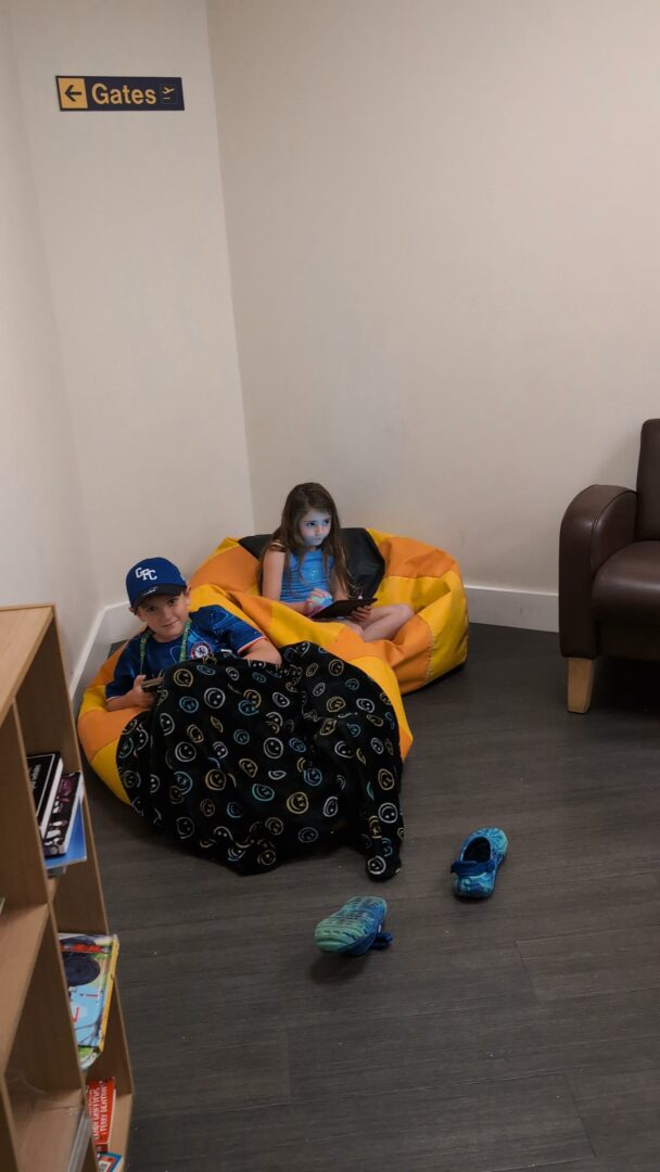 children in UK airport sensory room / sunflower room
